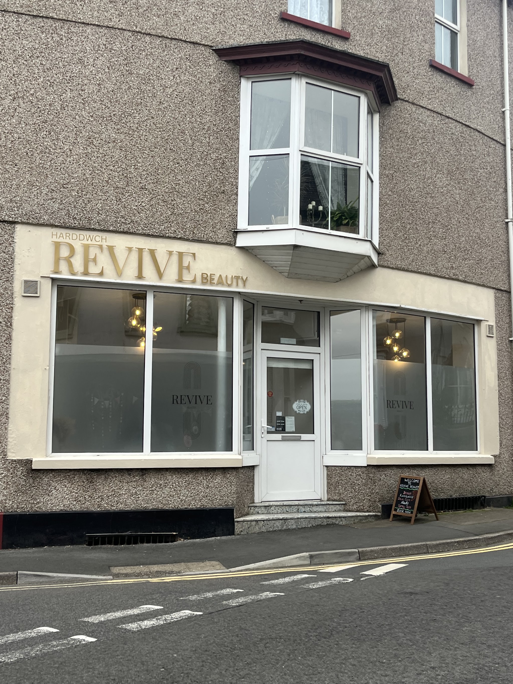 The Revive Beauty shopfront on Carmarthen Street with gold lettering