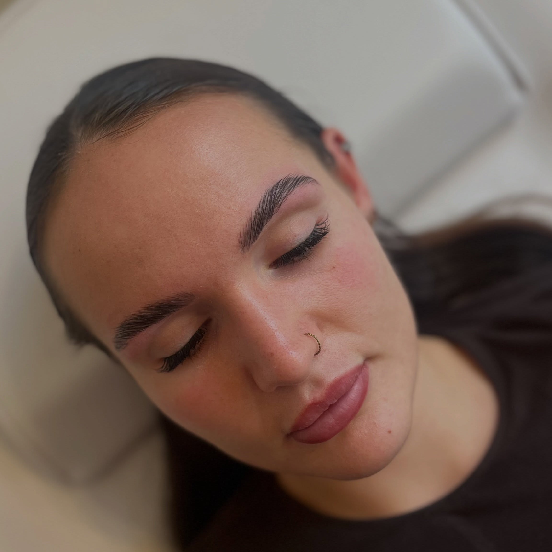 Brow lamination result with fuller, fluffier brows